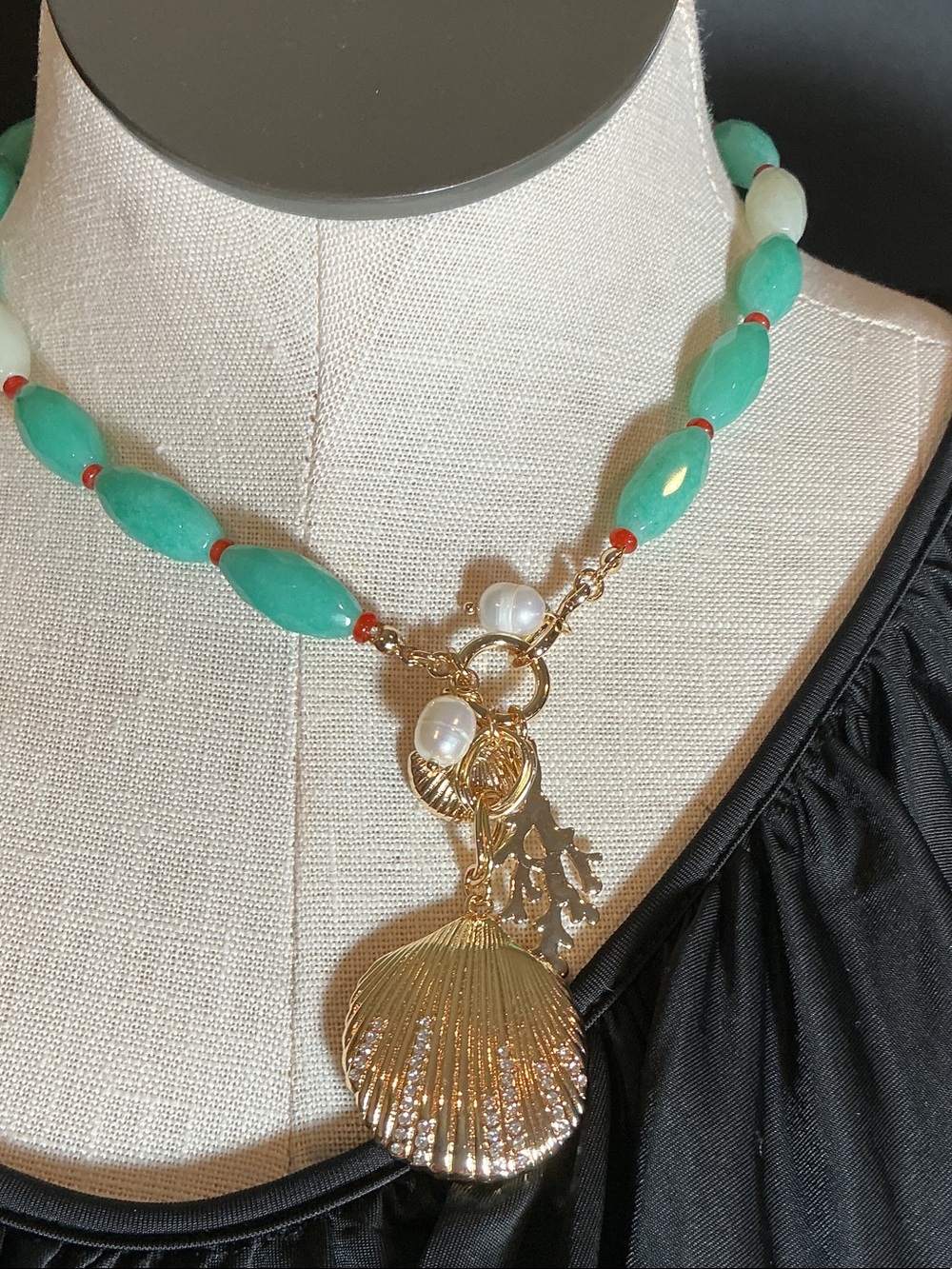 Gold Shell Pendant Necklace with Teal Beads and Red Accents
